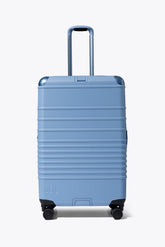 The Hybrid Check-In Roller in Dusty Blue